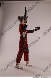 DENISA WITH TWO GUNS